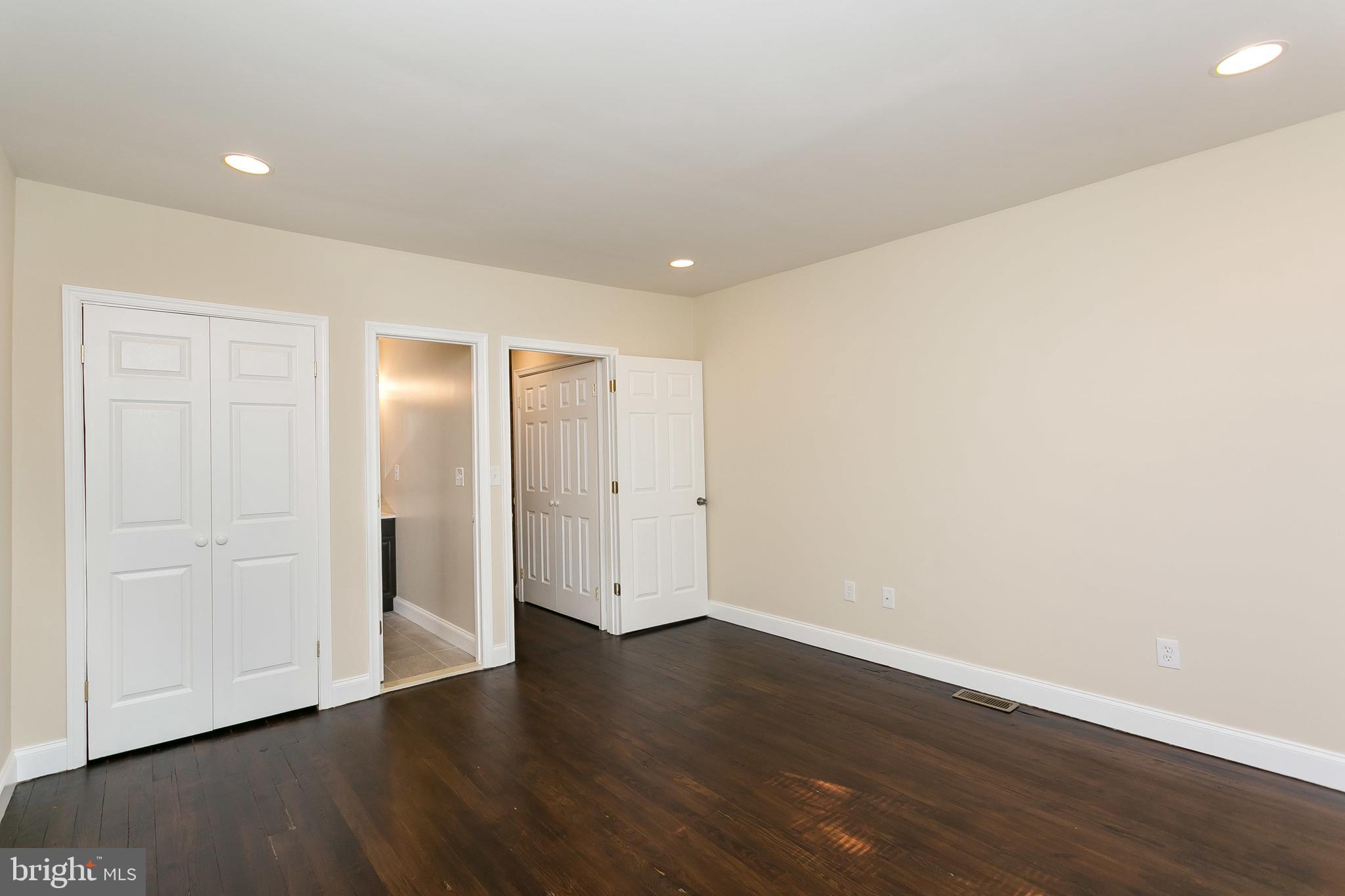 302 East 27th Street Baltimore, MD 21218 - Photo 22 of 31 Front bedroom attached full bath