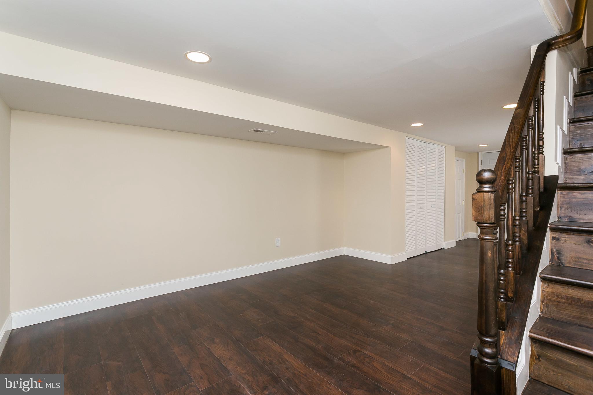 302 East 27th Street Baltimore, MD 21218 - Photo 24 of 31 Full finished basement with lots of living space