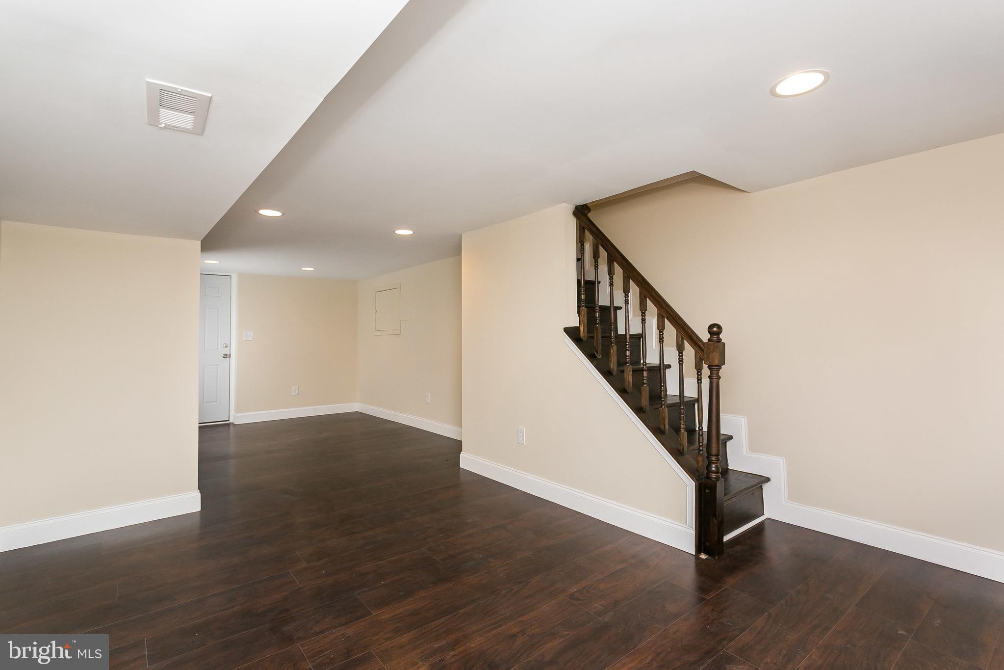 302 East 27th Street Baltimore, MD 21218 - Photo 25 of 31 Large basement- living room/office