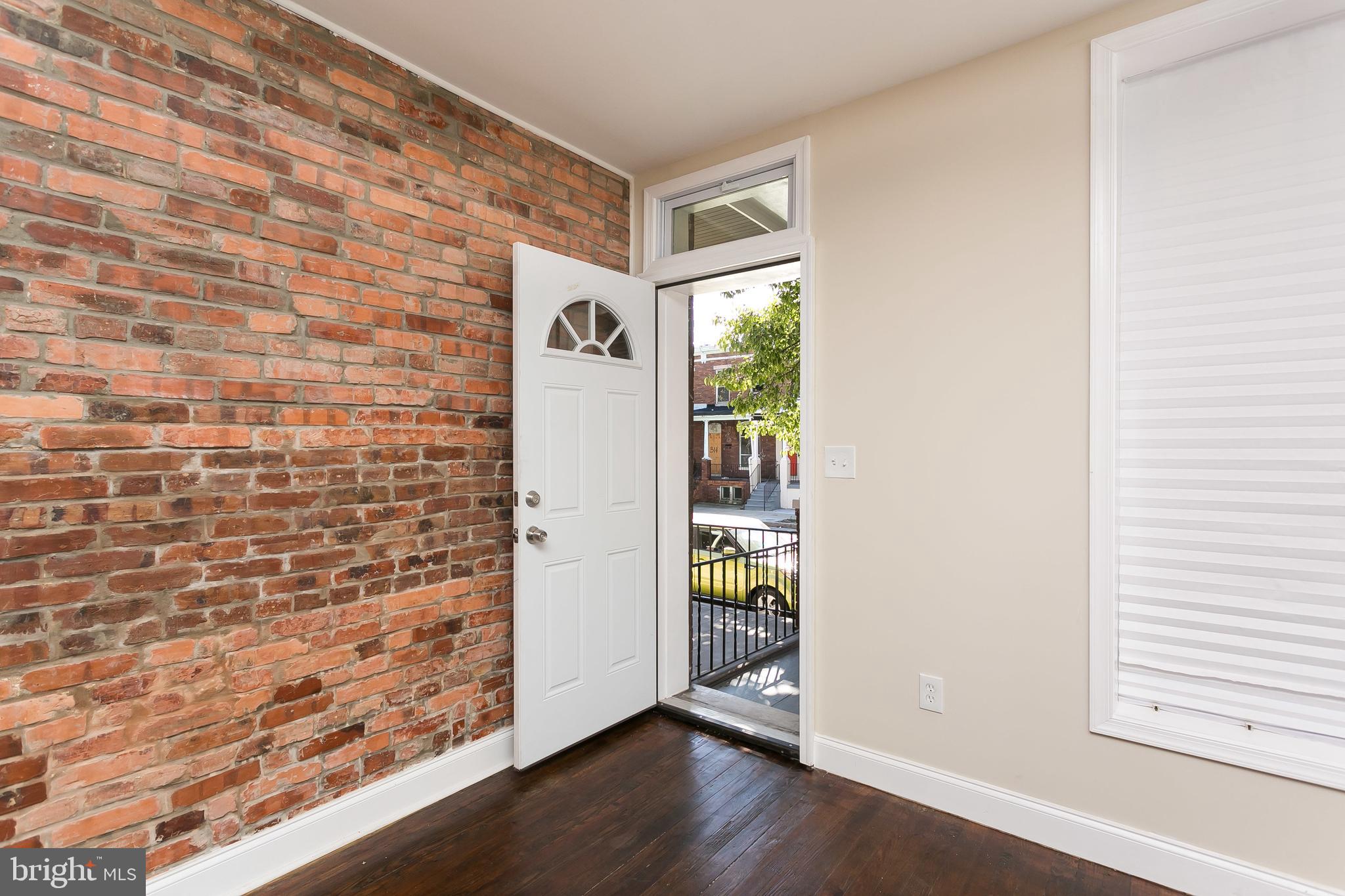 302 East 27th Street Baltimore, MD 21218 - Photo 5 of 31 front door to front porch