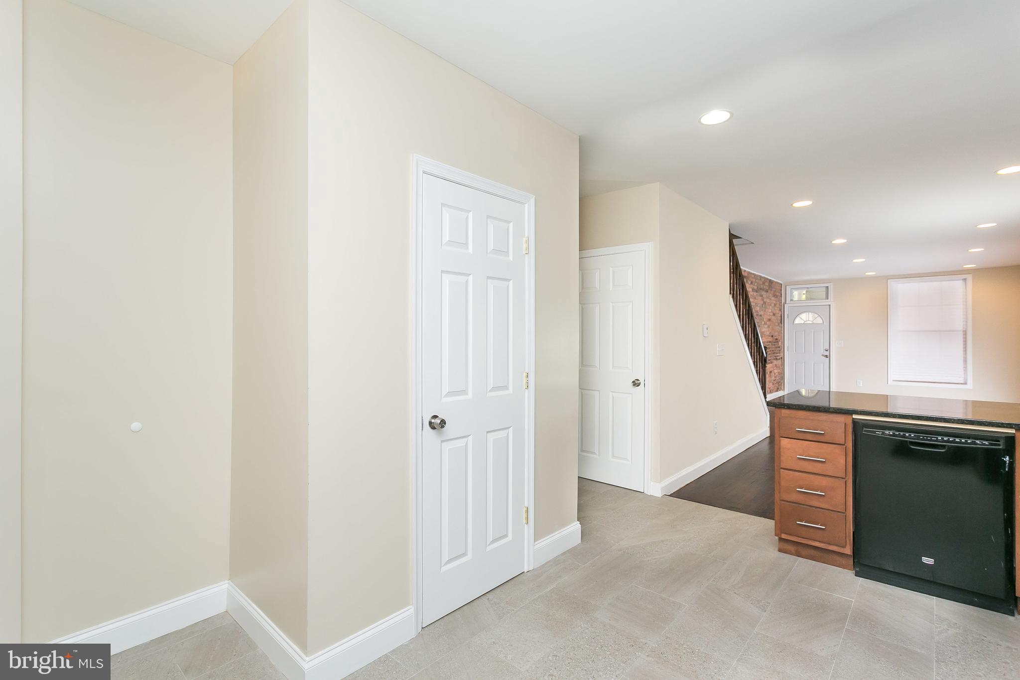 302 East 27th Street Baltimore, MD 21218 - Photo 9 of 31 Half bath in kitchen