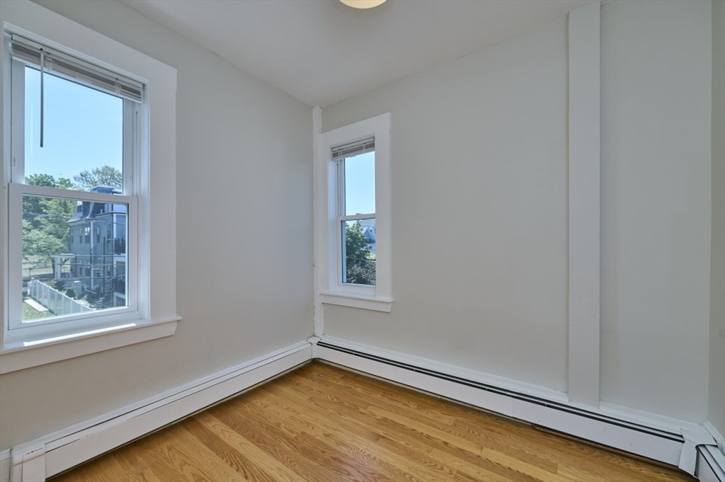67 Wheatland Street, Unit 2 Somerville, MA 02145 - Photo 7 of 19 a view of a room with window