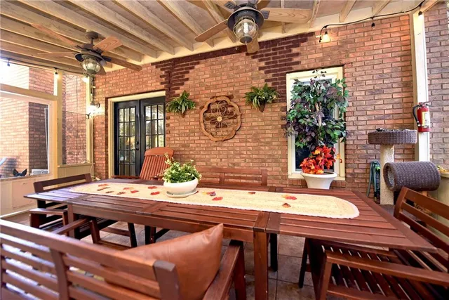 a outdoor dining space with furniture