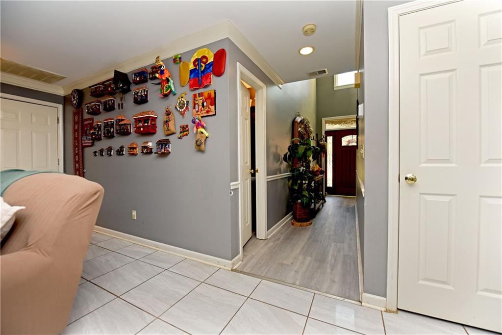 107 East Clinton Drive Southwest Rome, GA 30165 - Photo 5 of 38 a view of a hallway and interior of a house