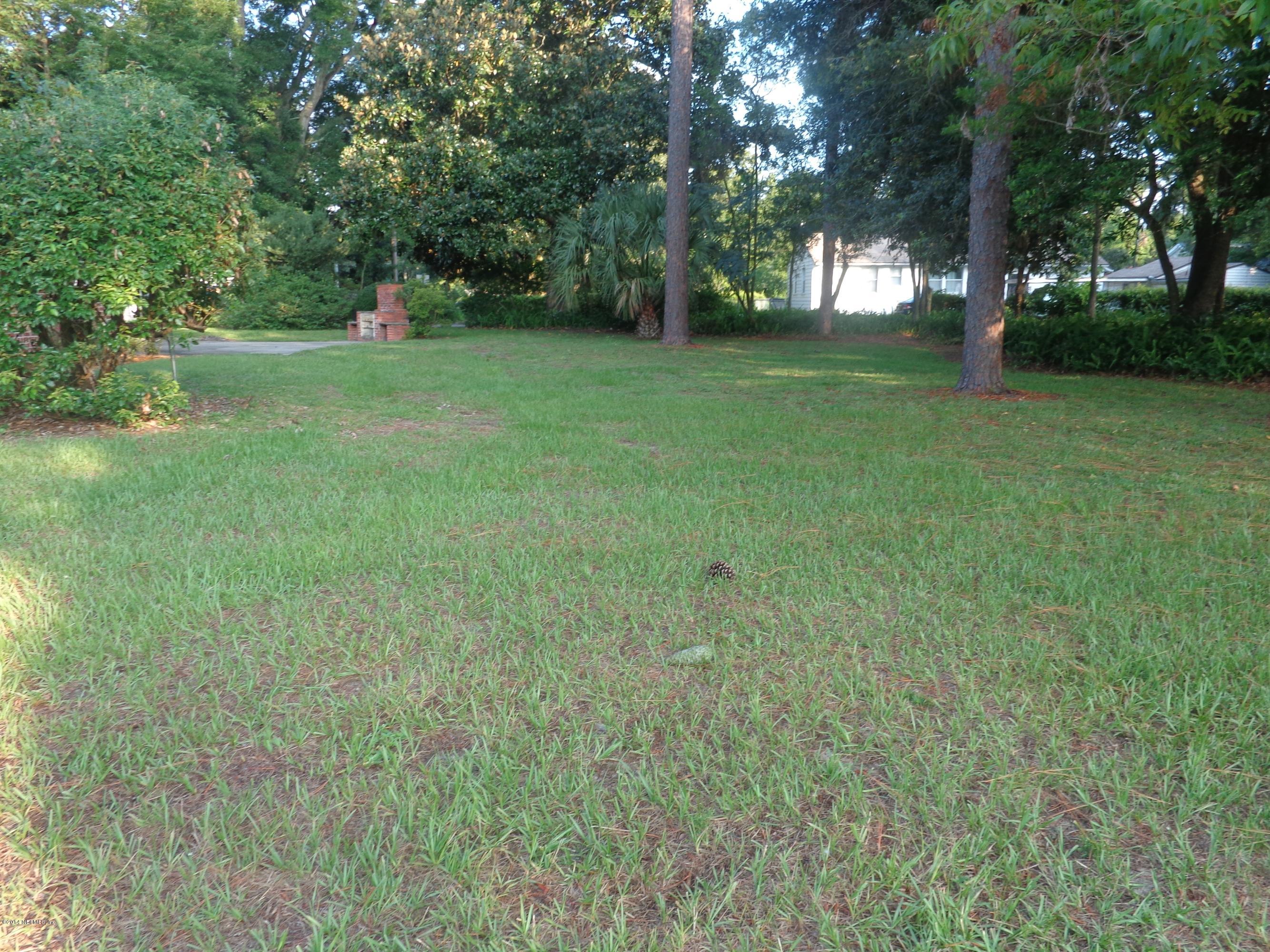 4114 London Road Jacksonville, FL 32207 - Photo 3 of 16 a view of a trees in a yard