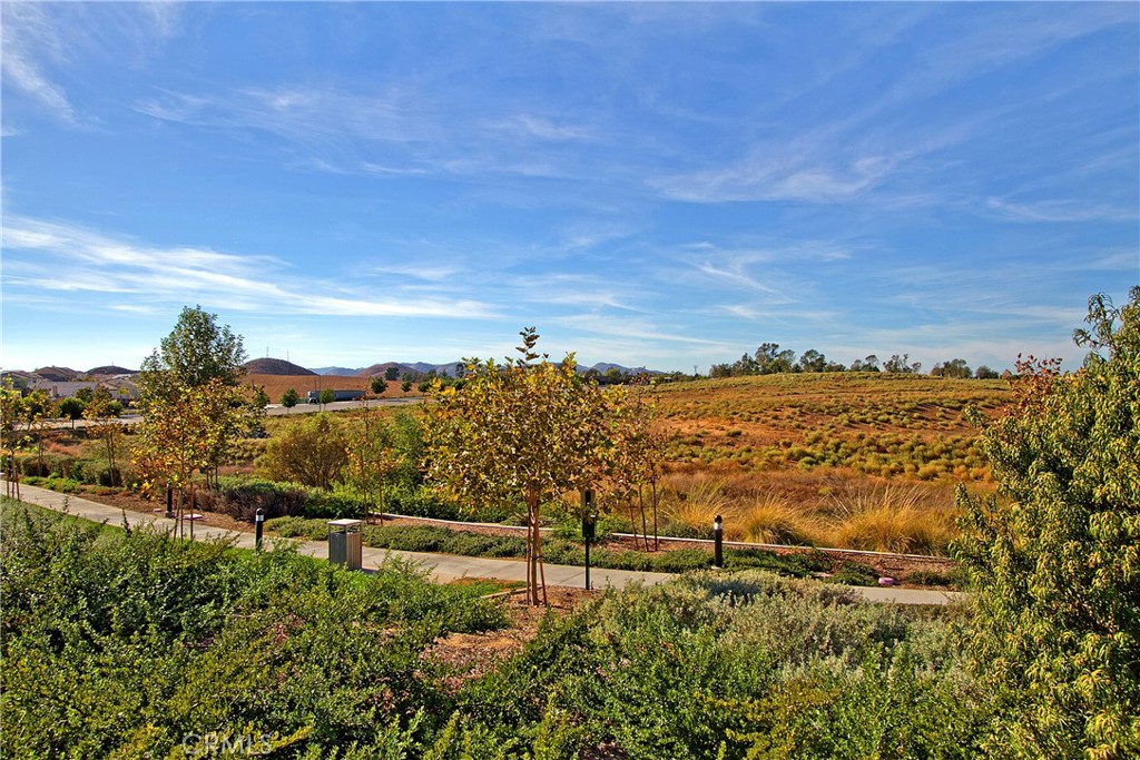 34727 Ribbon Grass Way Murrieta, CA 92563 - Photo 46 of 54 Miles of scenic paseos and regional trails weave throughout Spencer’s Crossing, encouraging walking, biking, and outdoor connection while linking parks, neighborhoods, and community spaces.