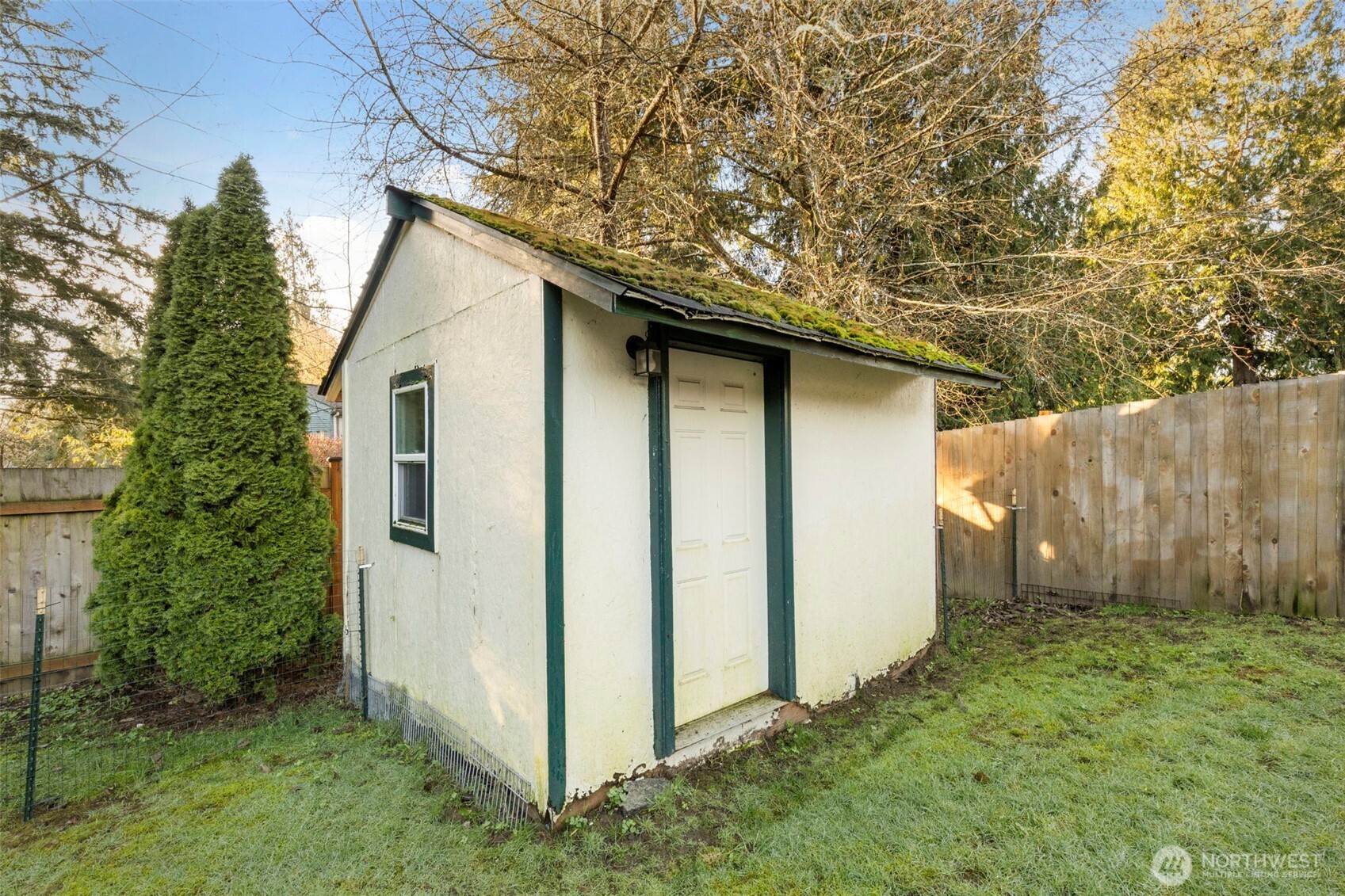 7606 Sandy Way Northeast Poulsbo, WA 98370 - Photo 14 of 20 a backyard of a house