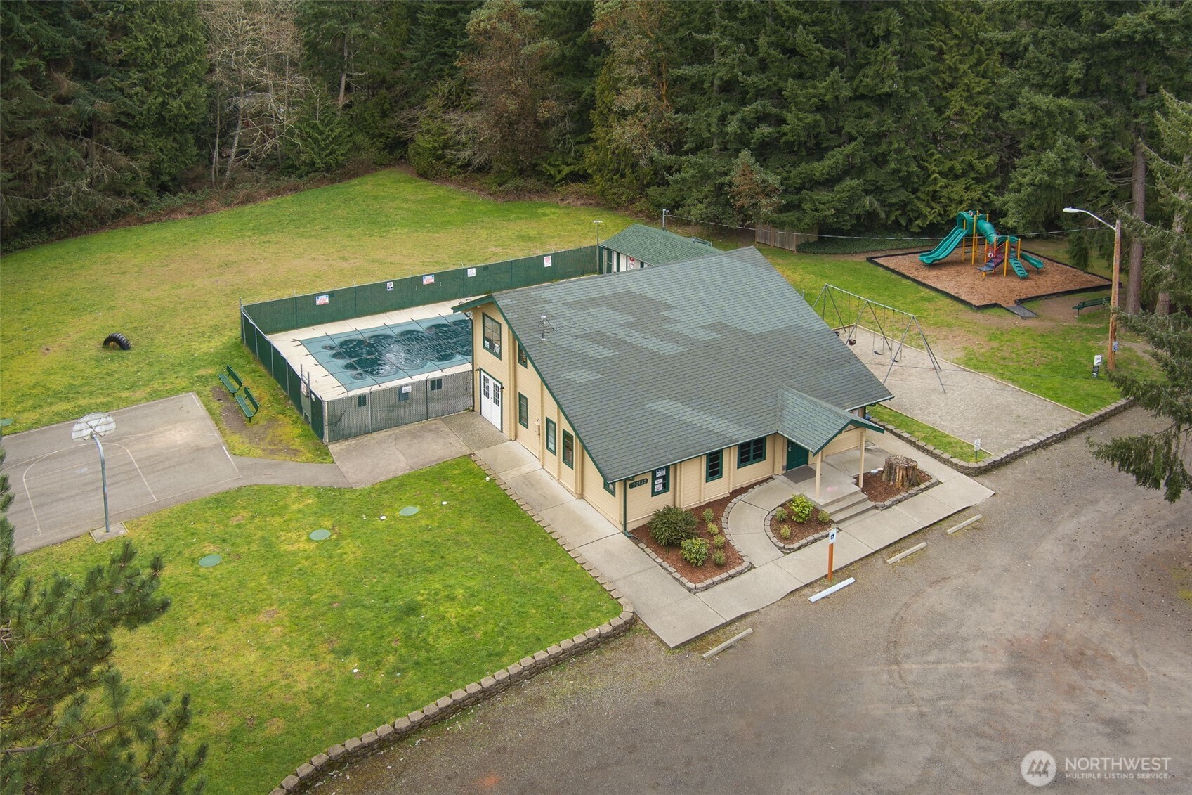 7606 Sandy Way Northeast Poulsbo, WA 98370 - Photo 17 of 20 swimming pool with chairs