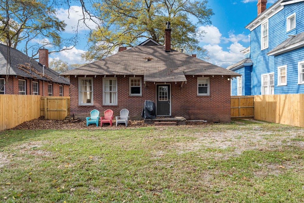 820 2nd Avenue Columbus, GA 31901 - Photo 24 of 28 a backyard of a house with table and chairs
