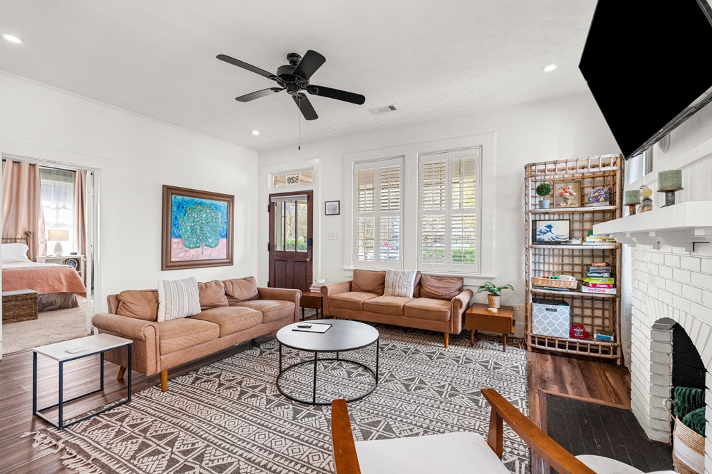 820 2nd Avenue Columbus, GA 31901 - Photo 6 of 28 a living room with furniture fireplace and a flat screen tv