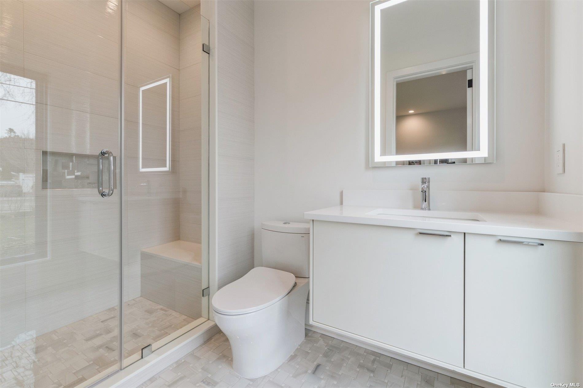 38 Sherrill Road East Hampton, NY 11937 - Photo 14 of 21 a bathroom with a sink toilet and shower