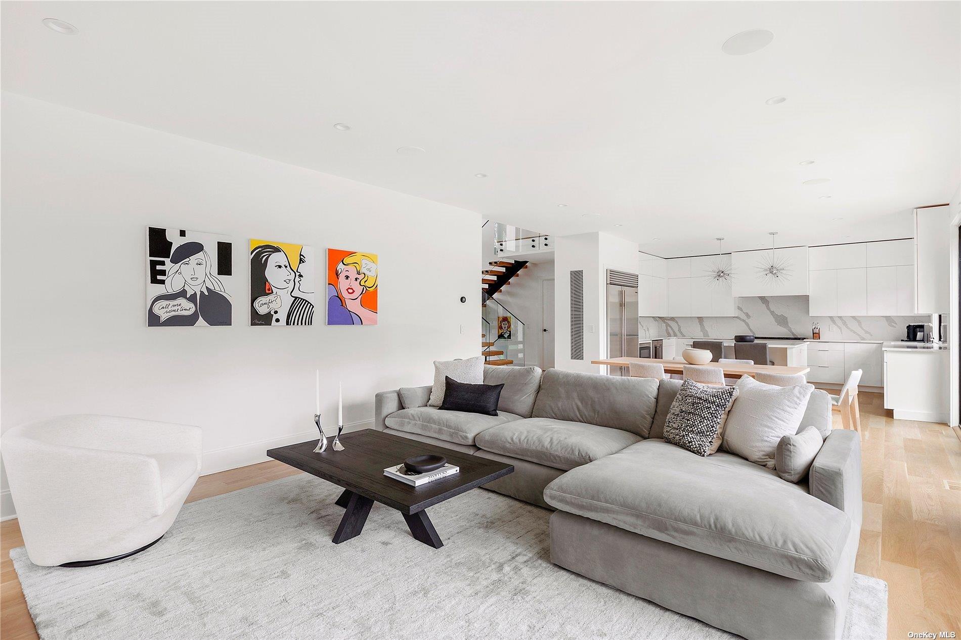 38 Sherrill Road East Hampton, NY 11937 - Photo 2 of 21 a living room with furniture a rug and a table