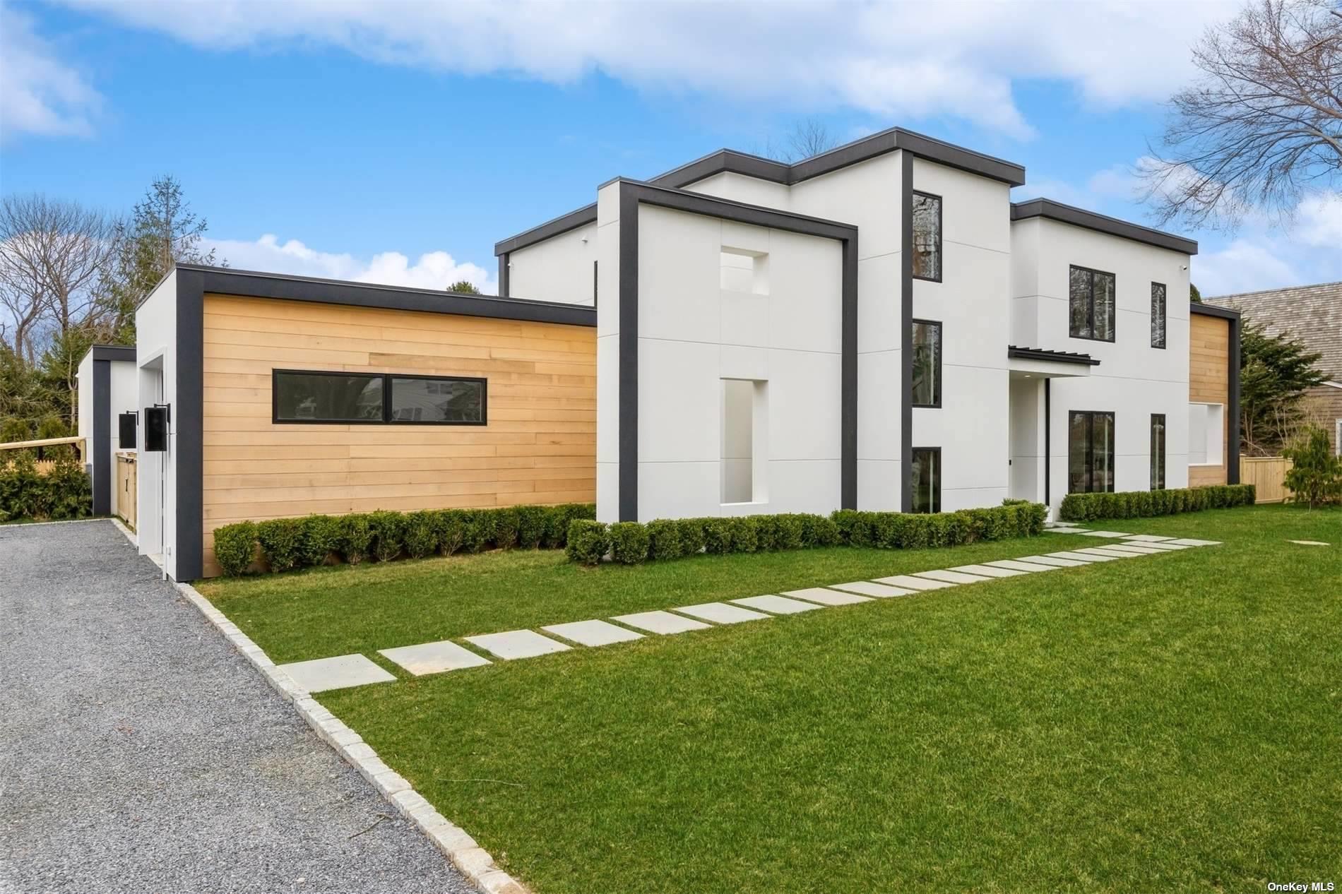 38 Sherrill Road East Hampton, NY 11937 - Photo 21 of 21 a front view of a house with a yard