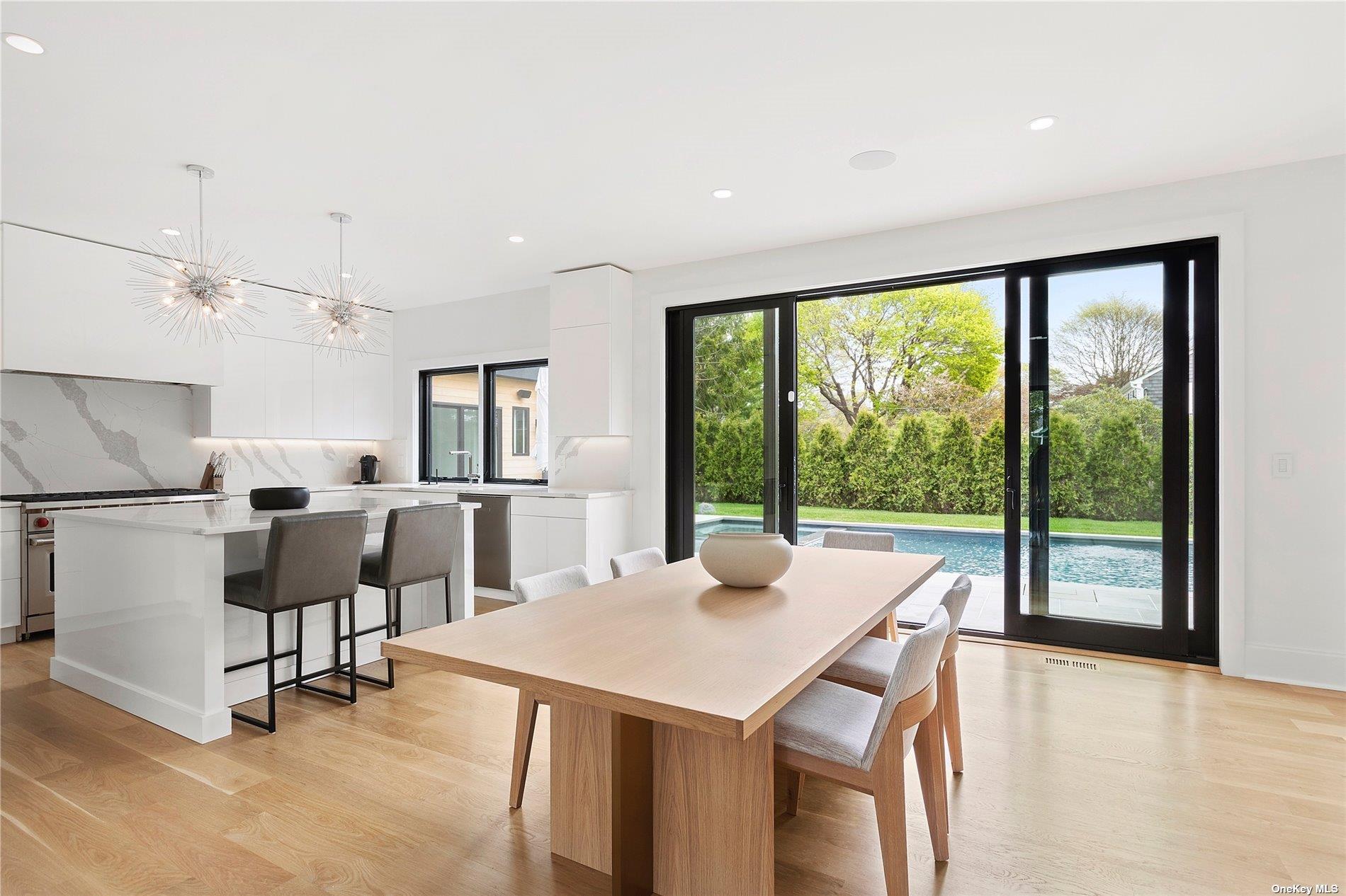 38 Sherrill Road East Hampton, NY 11937 - Photo 4 of 21 a view of a dining room with furniture window and outside view