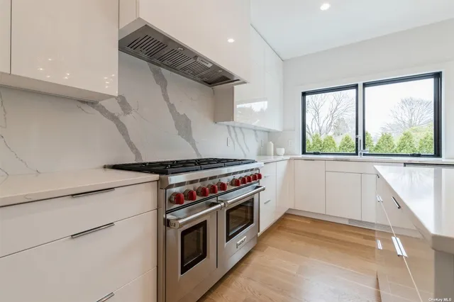 a kitchen with a stove and a microwave