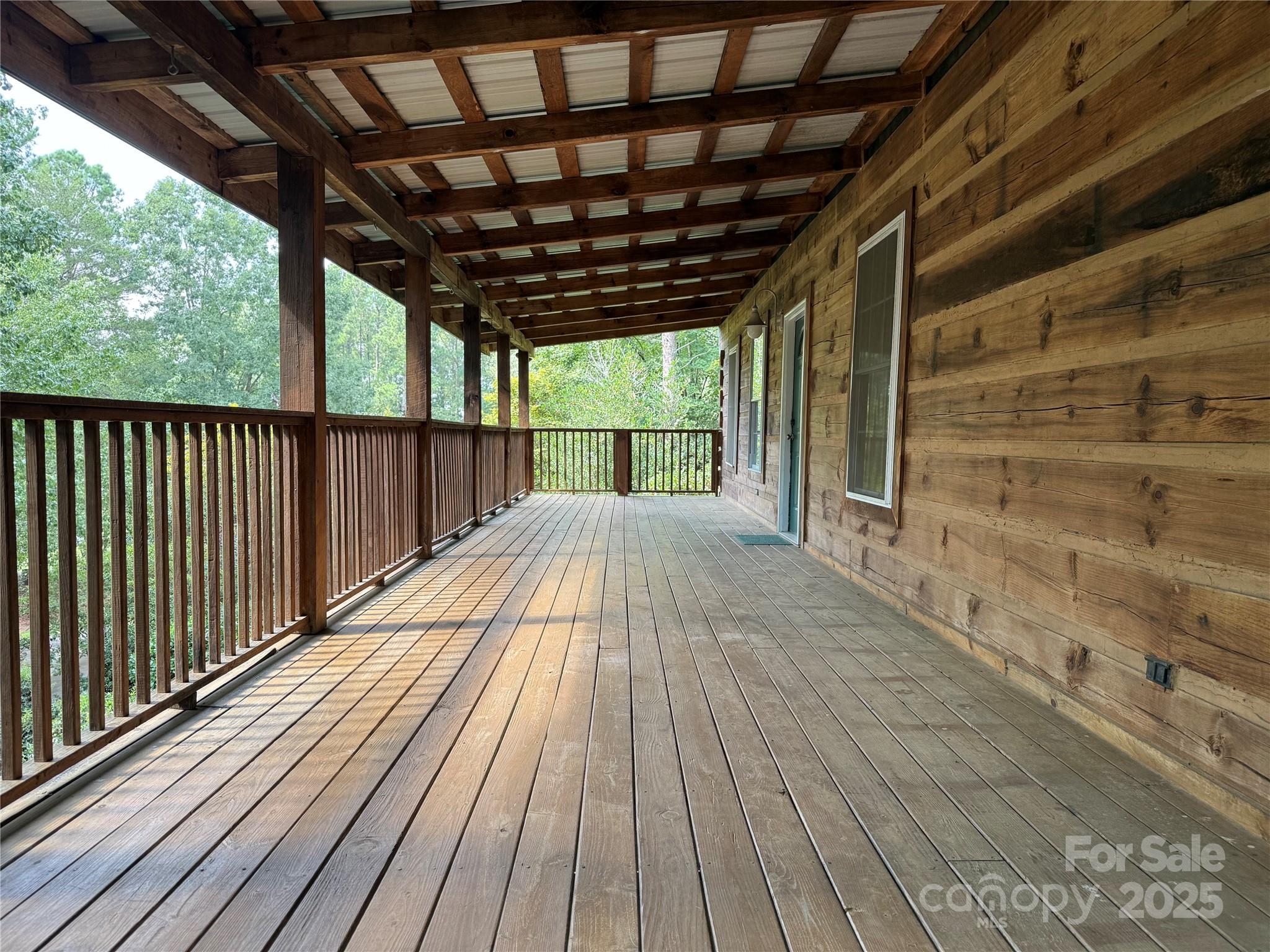 66 Ashlyn Lane Tryon, NC 28782 - Photo 11 of 40 a view of porch with wooden floor