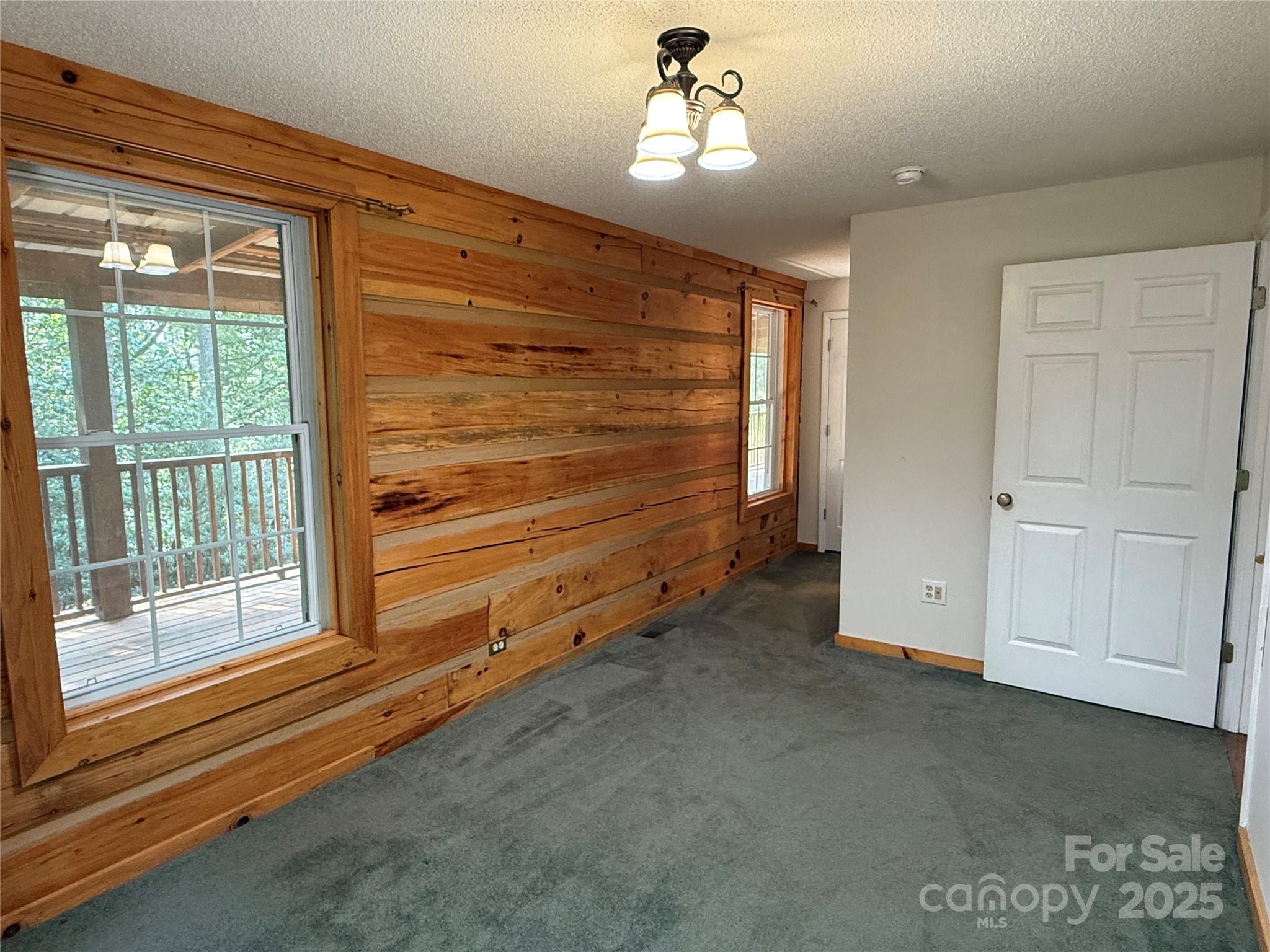 66 Ashlyn Lane Tryon, NC 28782 - Photo 26 of 40 a view of empty room with windows