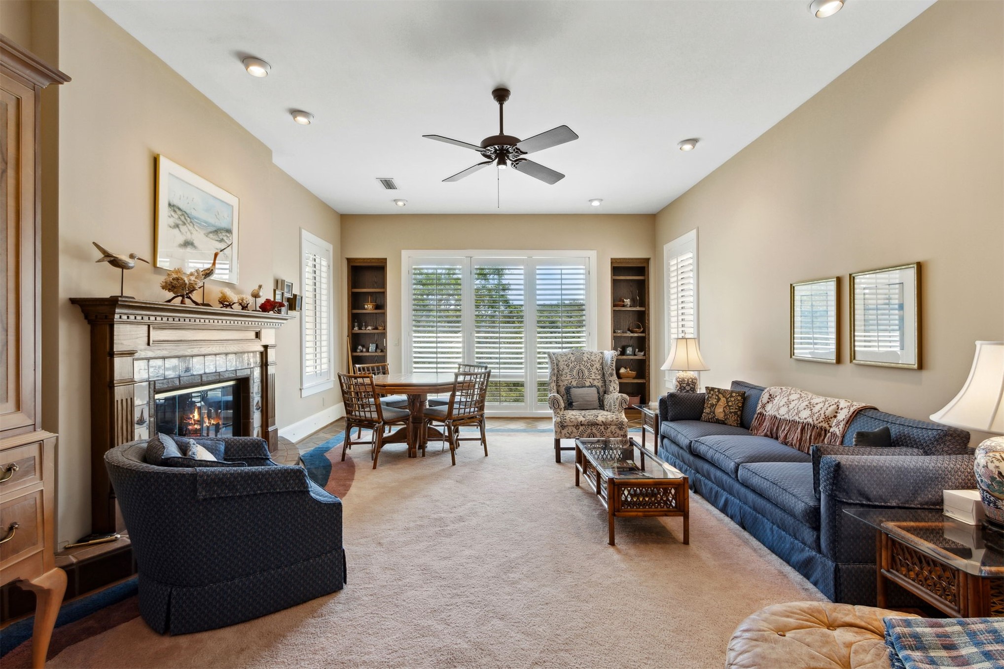 28 Dunes Row Fernandina Beach, FL 32034 - Photo 37 of 99 a living room with furniture large window and flat screen tv