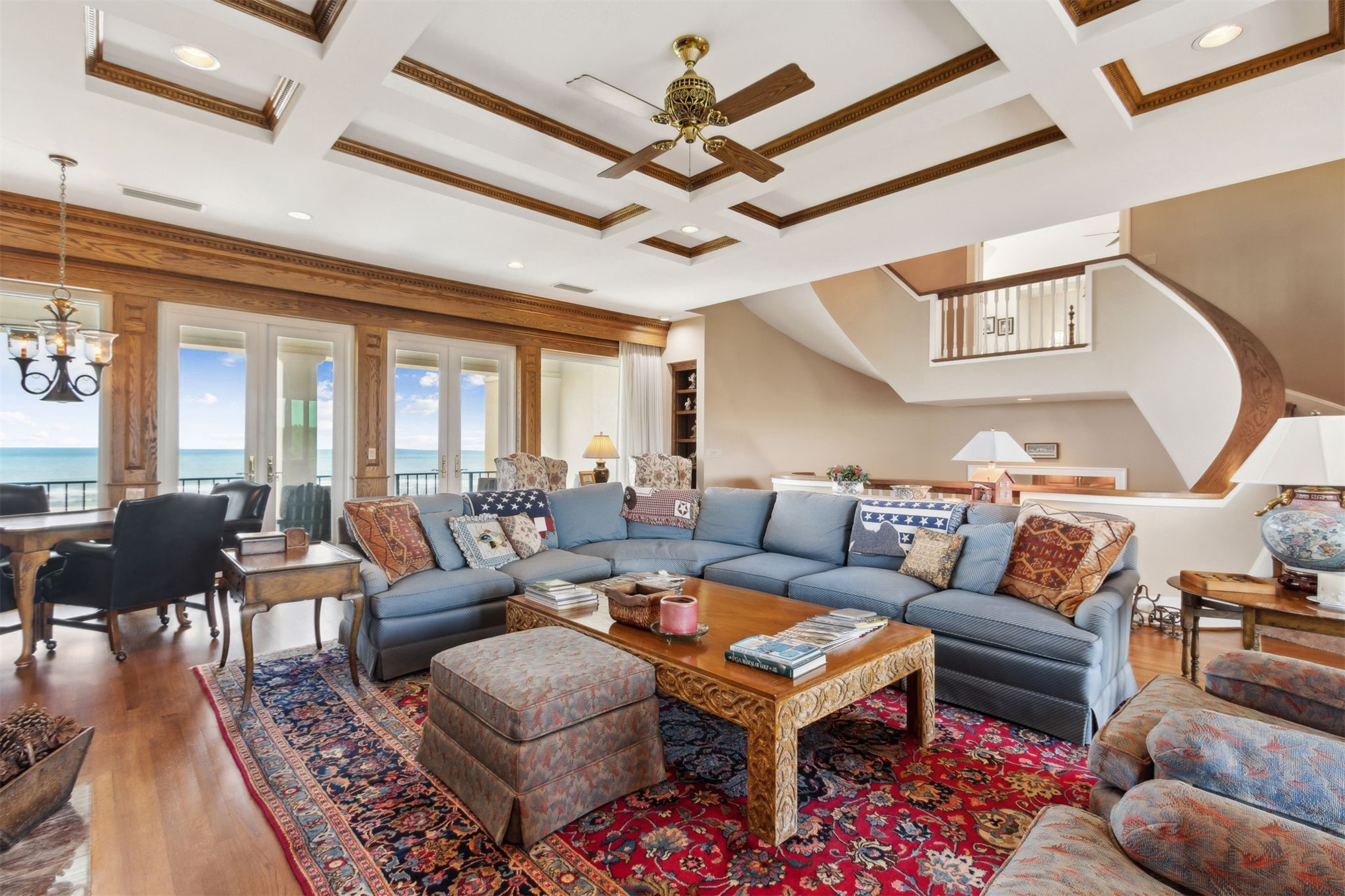 28 Dunes Row Fernandina Beach, FL 32034 - Photo 38 of 96 a living room with furniture a rug and a chandelier