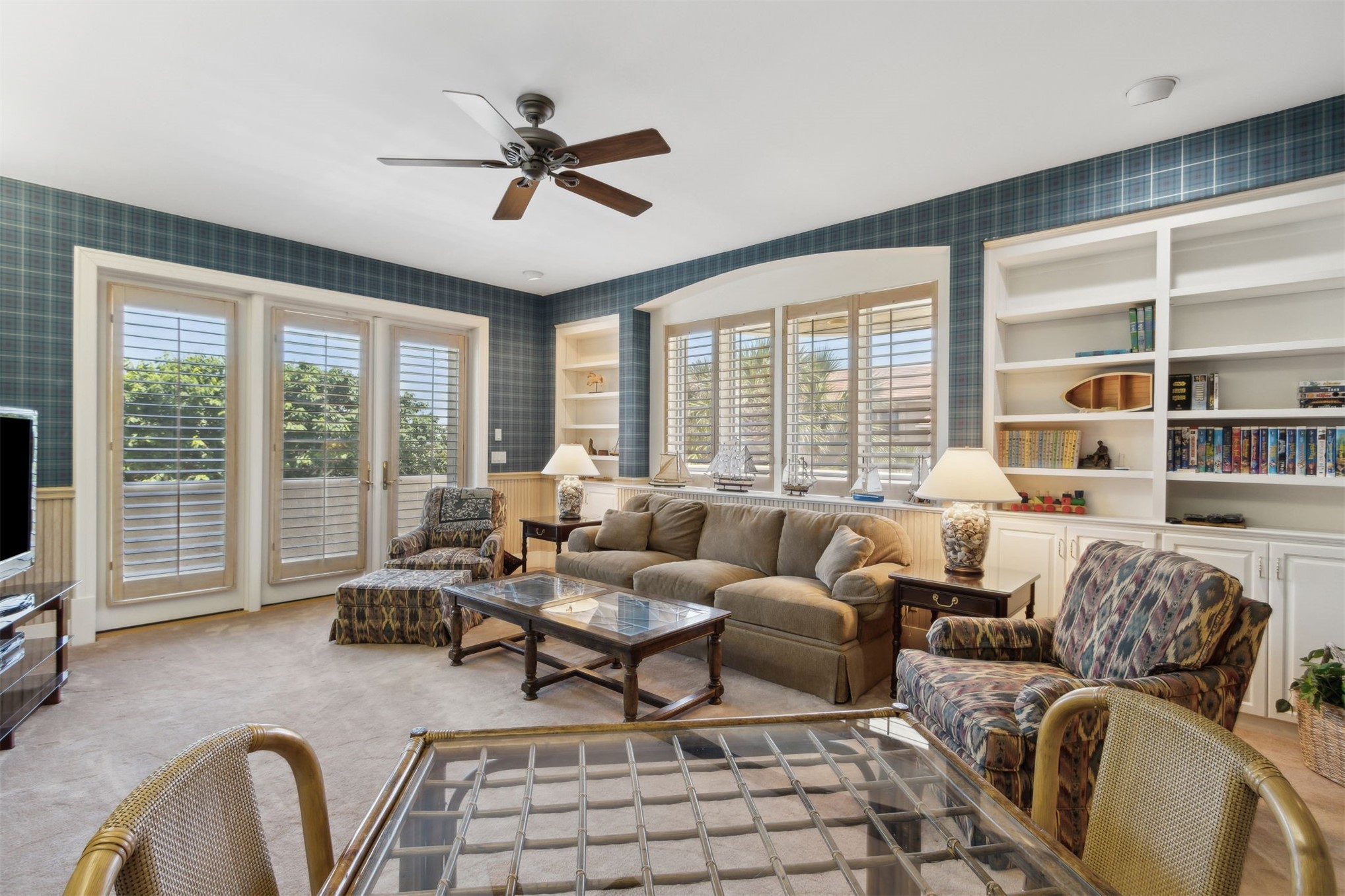 28 Dunes Row Fernandina Beach, FL 32034 - Photo 62 of 99 a living room with furniture and floor to ceiling windows