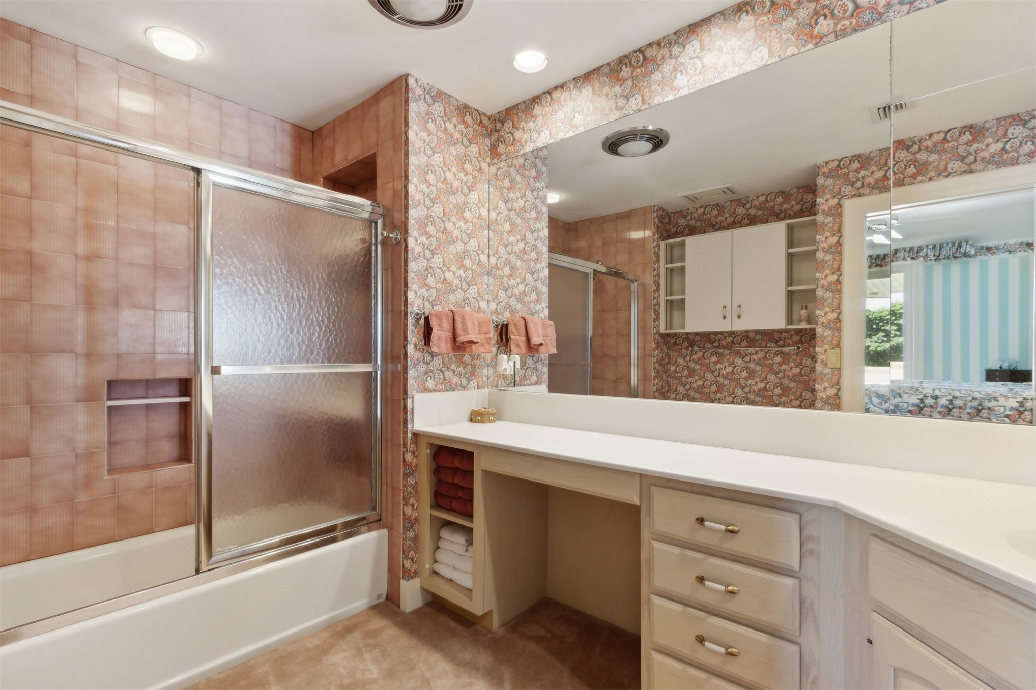 28 Dunes Row Fernandina Beach, FL 32034 - Photo 62 of 96 a bathroom with a shower sink and mirror