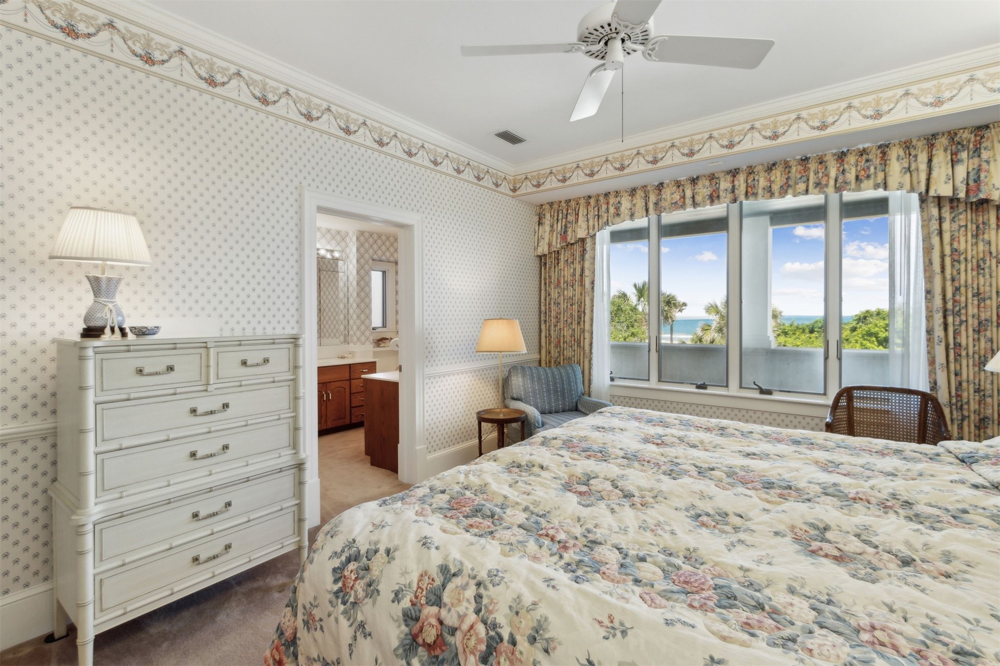 28 Dunes Row Fernandina Beach, FL 32034 - Photo 66 of 96 a bedroom with a large bed and a window