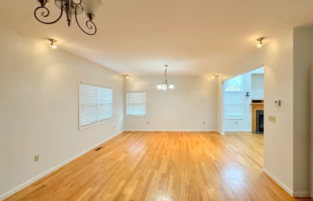 a kitchen with stainless steel appliances granite countertop a refrigerator and cabinets