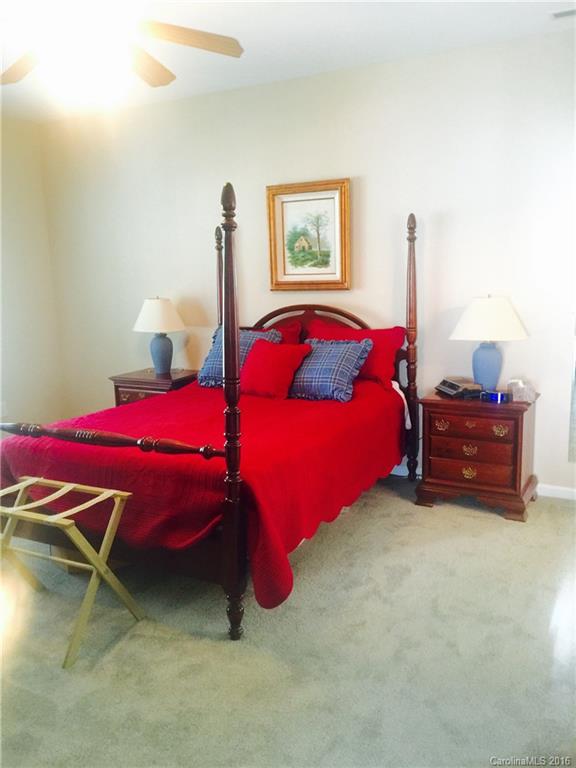 1003 Platinum Drive Fort Mill, SC 29708 - Photo 11 of 20 a bedroom with bed and a table