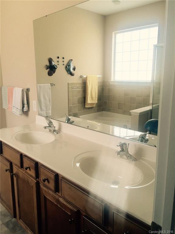 1003 Platinum Drive Fort Mill, SC 29708 - Photo 12 of 20 a bathroom with a sink and a mirror