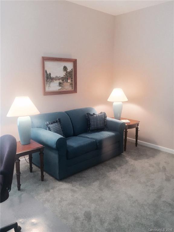 1003 Platinum Drive Fort Mill, SC 29708 - Photo 14 of 20 a living room with furniture a lamp and a lamp