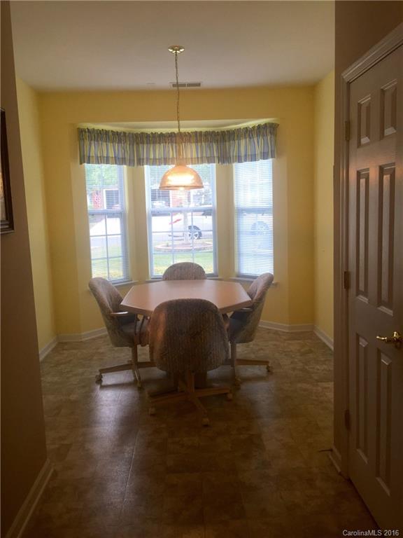 1003 Platinum Drive Fort Mill, SC 29708 - Photo 3 of 20 a dining room with furniture and window