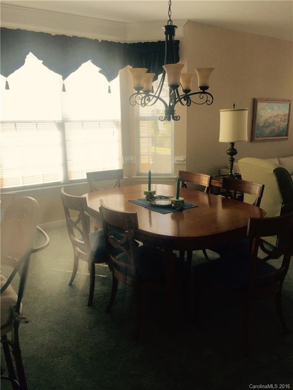 1003 Platinum Drive Fort Mill, SC 29708 - Photo 7 of 20 a view of a dining room with furniture and window