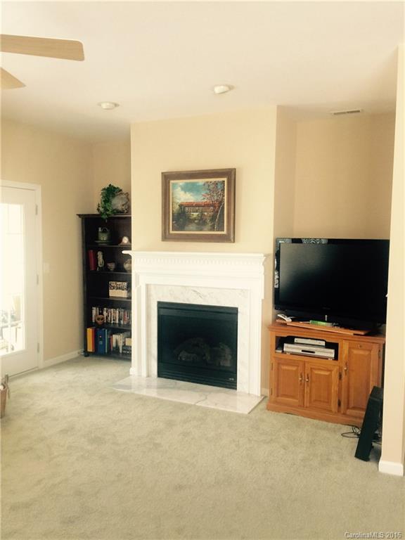 1003 Platinum Drive Fort Mill, SC 29708 - Photo 10 of 20 a living room with furniture and a flat screen tv