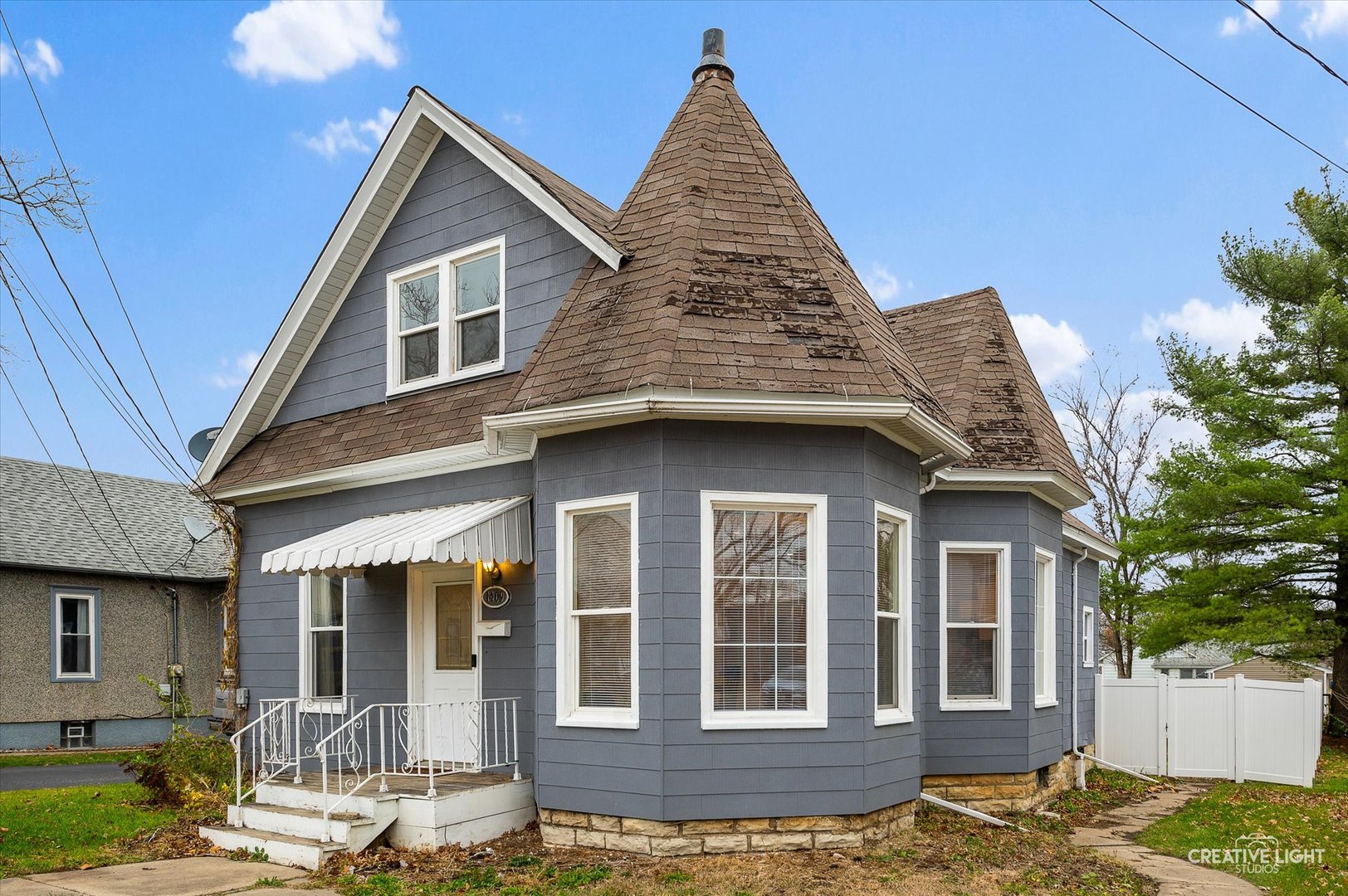 1409 Pulaski Street Peru, IL 61354 - Photo 1 of 20 a view of a house with a yard