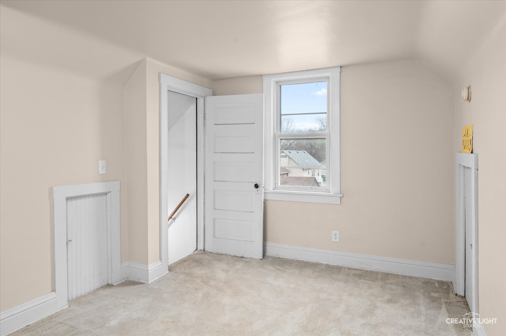 1409 Pulaski Street Peru, IL 61354 - Photo 13 of 20 an empty room with windows and closet