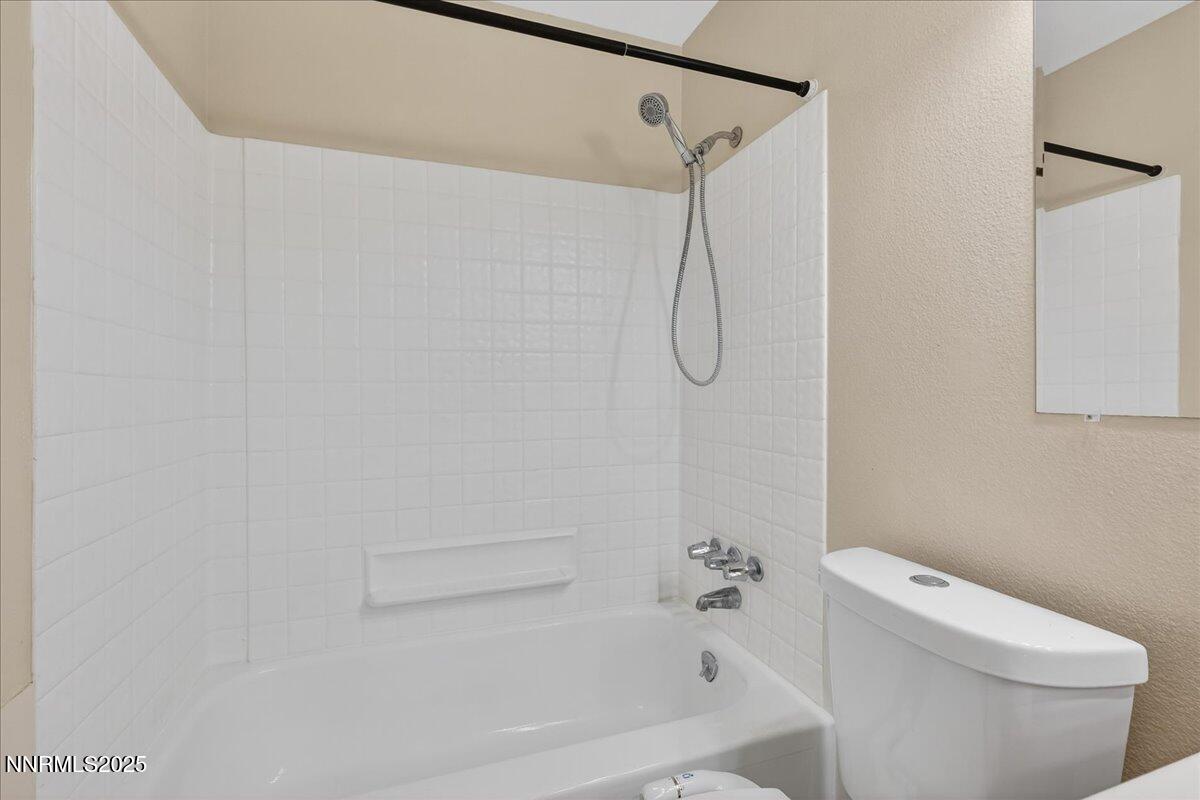 1495 Doric Drive Reno, NV 89503 - Photo 29 of 42 a bathroom with a shower and a toilet