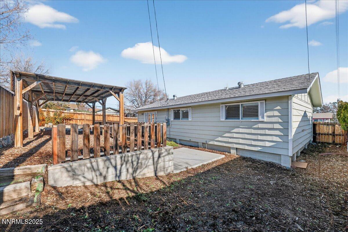 1495 Doric Drive Reno, NV 89503 - Photo 36 of 42 a view of a livingroom with furniture and staircase