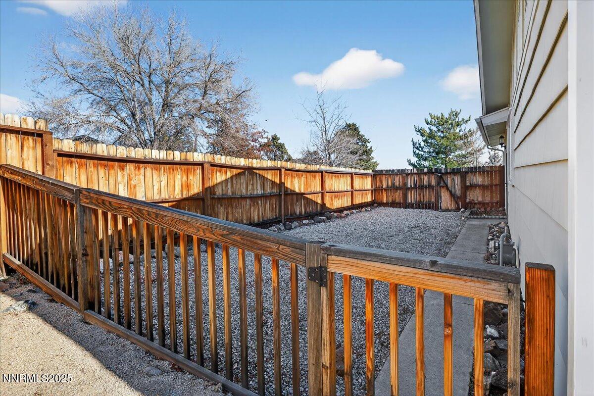 1495 Doric Drive Reno, NV 89503 - Photo 38 of 42 a view of balcony with wooden floor and fence