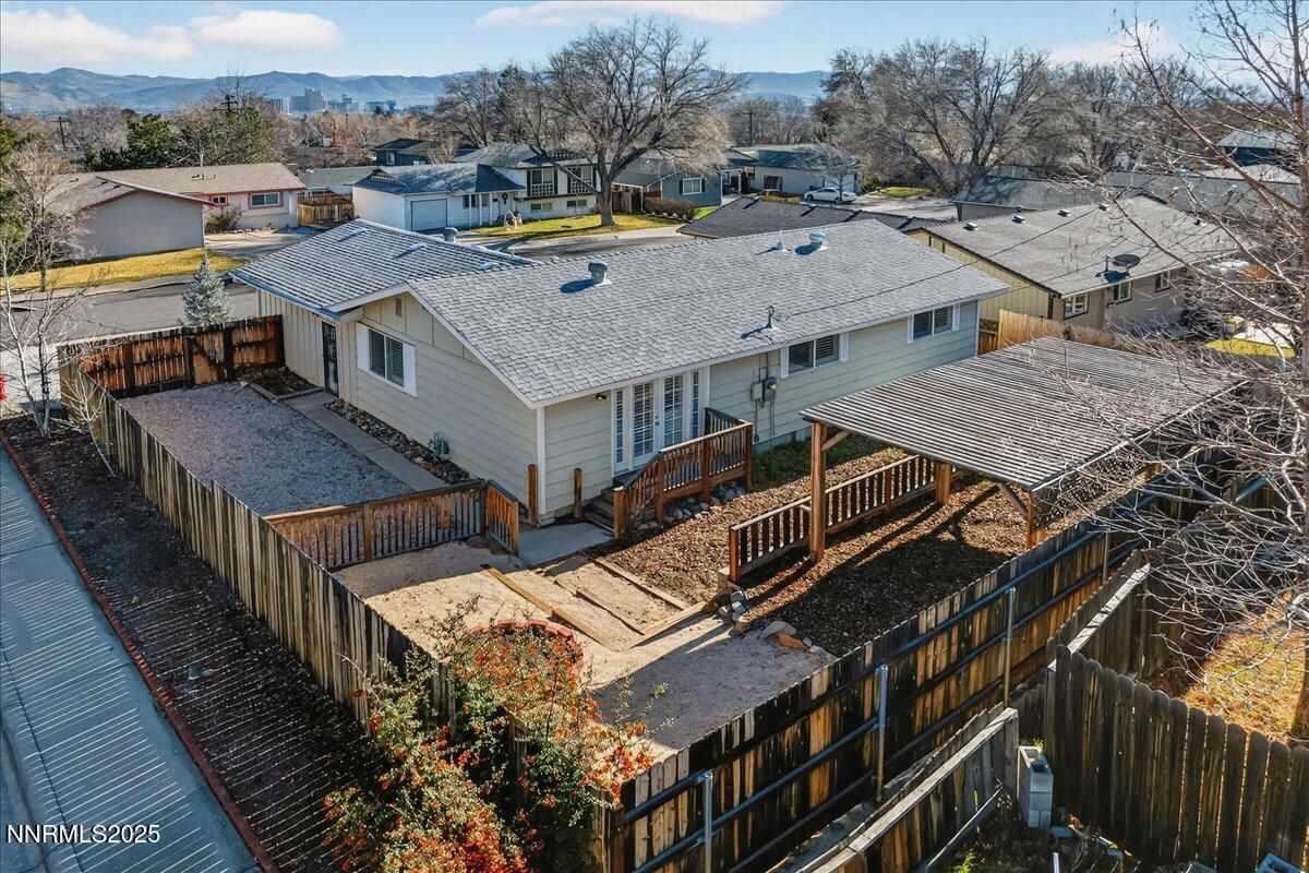 1495 Doric Drive Reno, NV 89503 - Photo 39 of 42 an aerial view of a house with a table and chairs