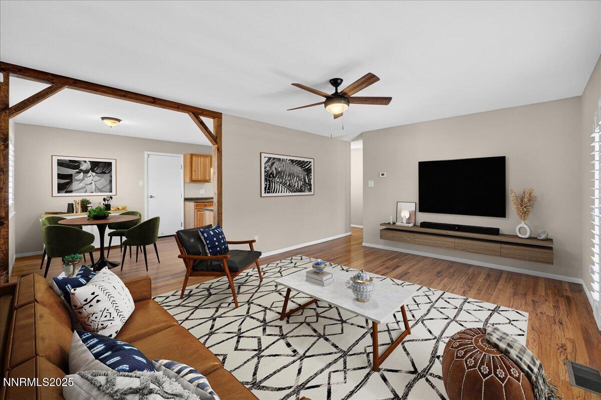 1495 Doric Drive Reno, NV 89503 - Photo 9 of 42 a living room with furniture and a flat screen tv