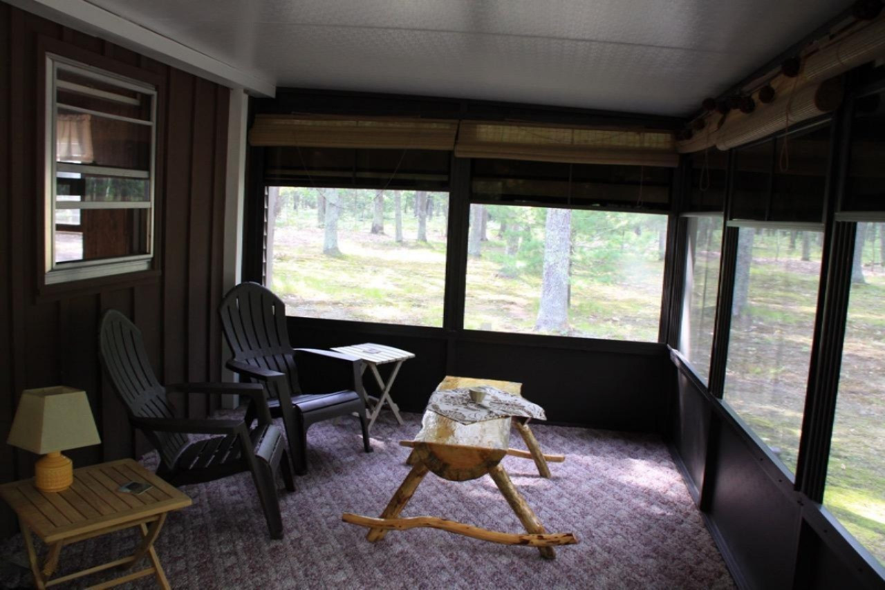 8920 South Hayes Road Baldwin, MI 49304 - Photo 18 of 21 Sunroom 1