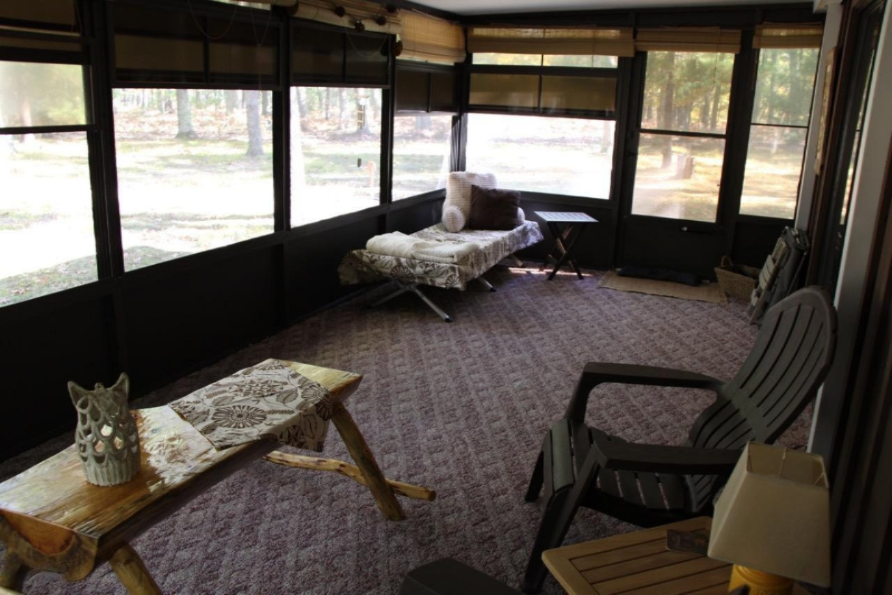 8920 South Hayes Road Baldwin, MI 49304 - Photo 19 of 21 Sunroom 2