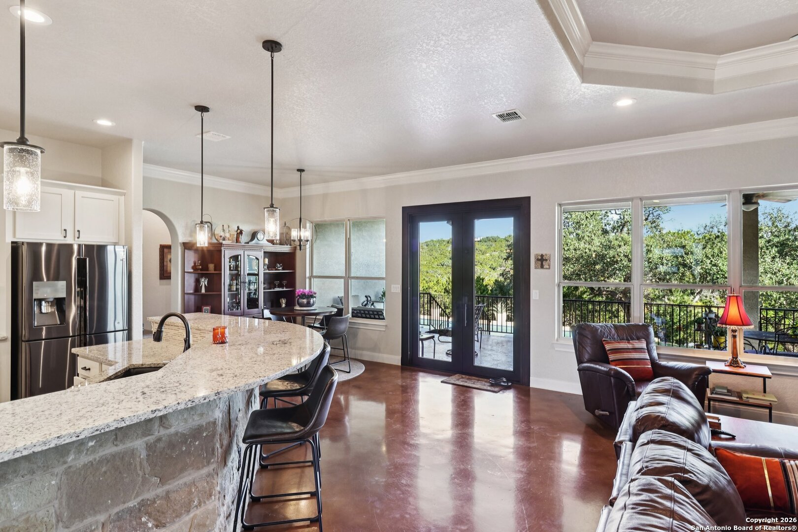 156 Pr 2771 Mico, TX 78056 - Photo 11 of 50 a dining room with furniture a chandelier and wooden floor