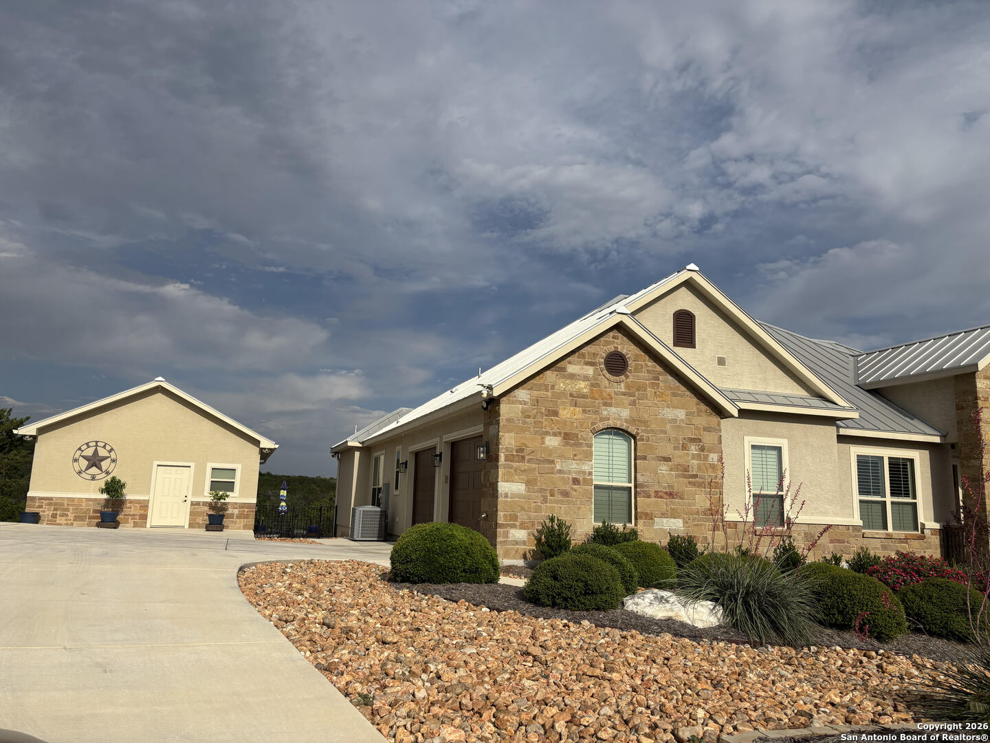 156 Pr 2771 Mico, TX 78056 - Photo 2 of 50 a front view of a house with garden
