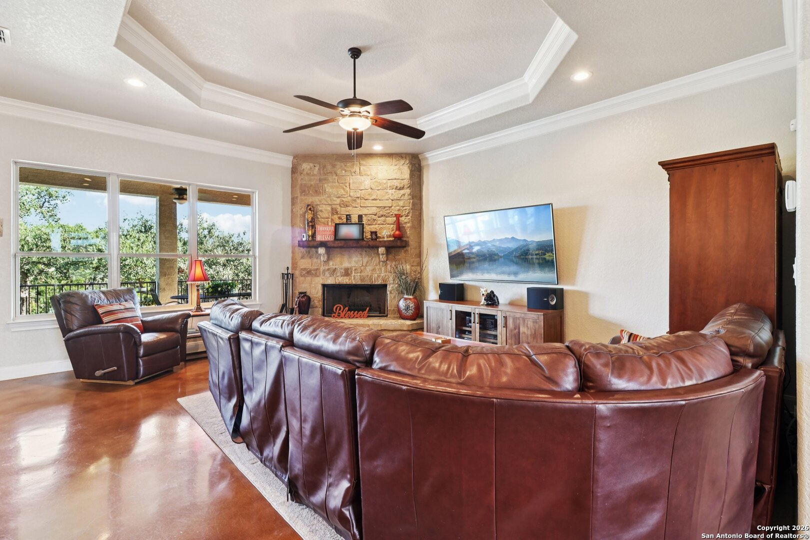 156 Pr 2771 Mico, TX 78056 - Photo 10 of 50 a living room with fireplace furniture and a large window