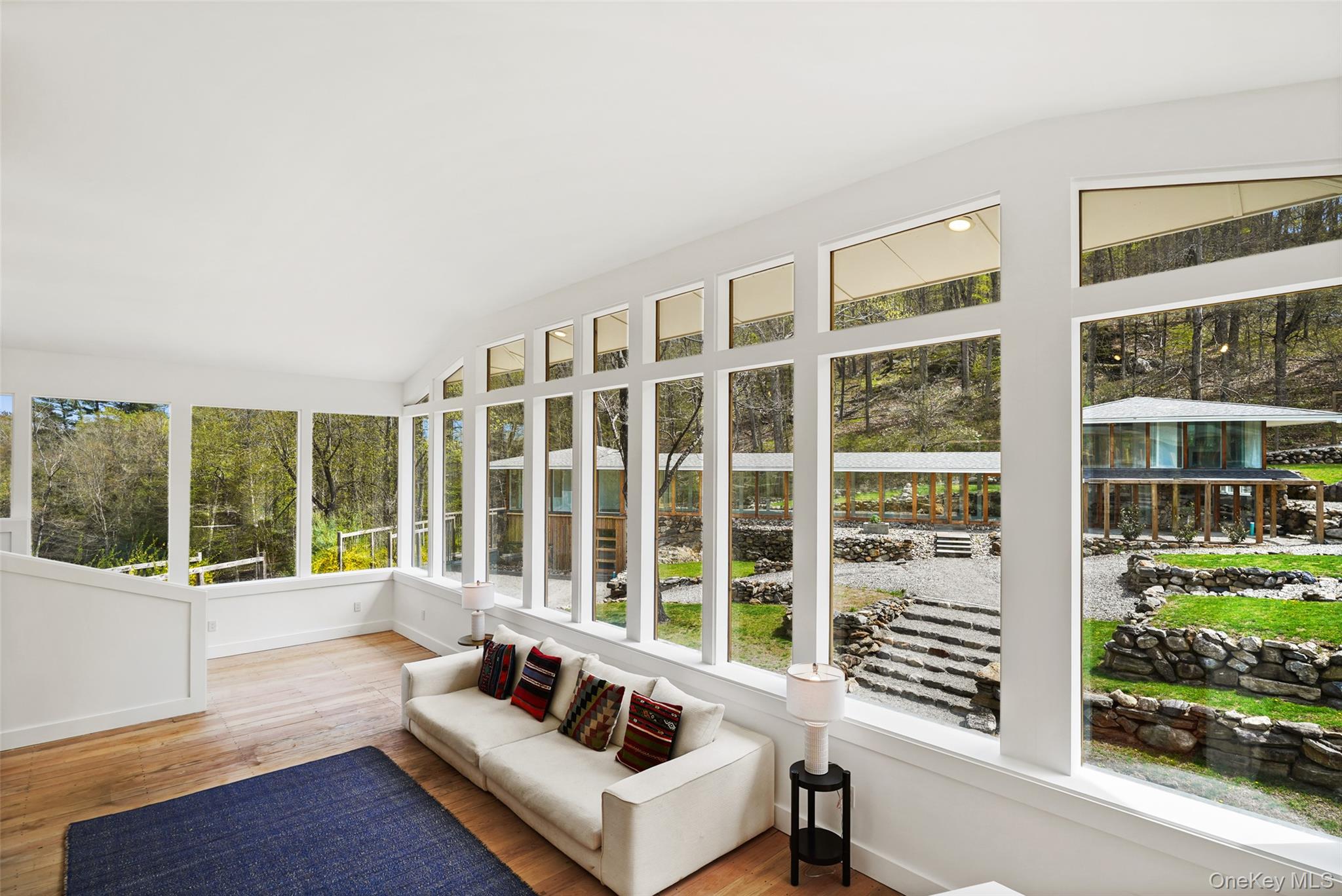 496 Haines Road Bedford Corners, NY 10549 - Photo 13 of 35 a living room with furniture and a large window
