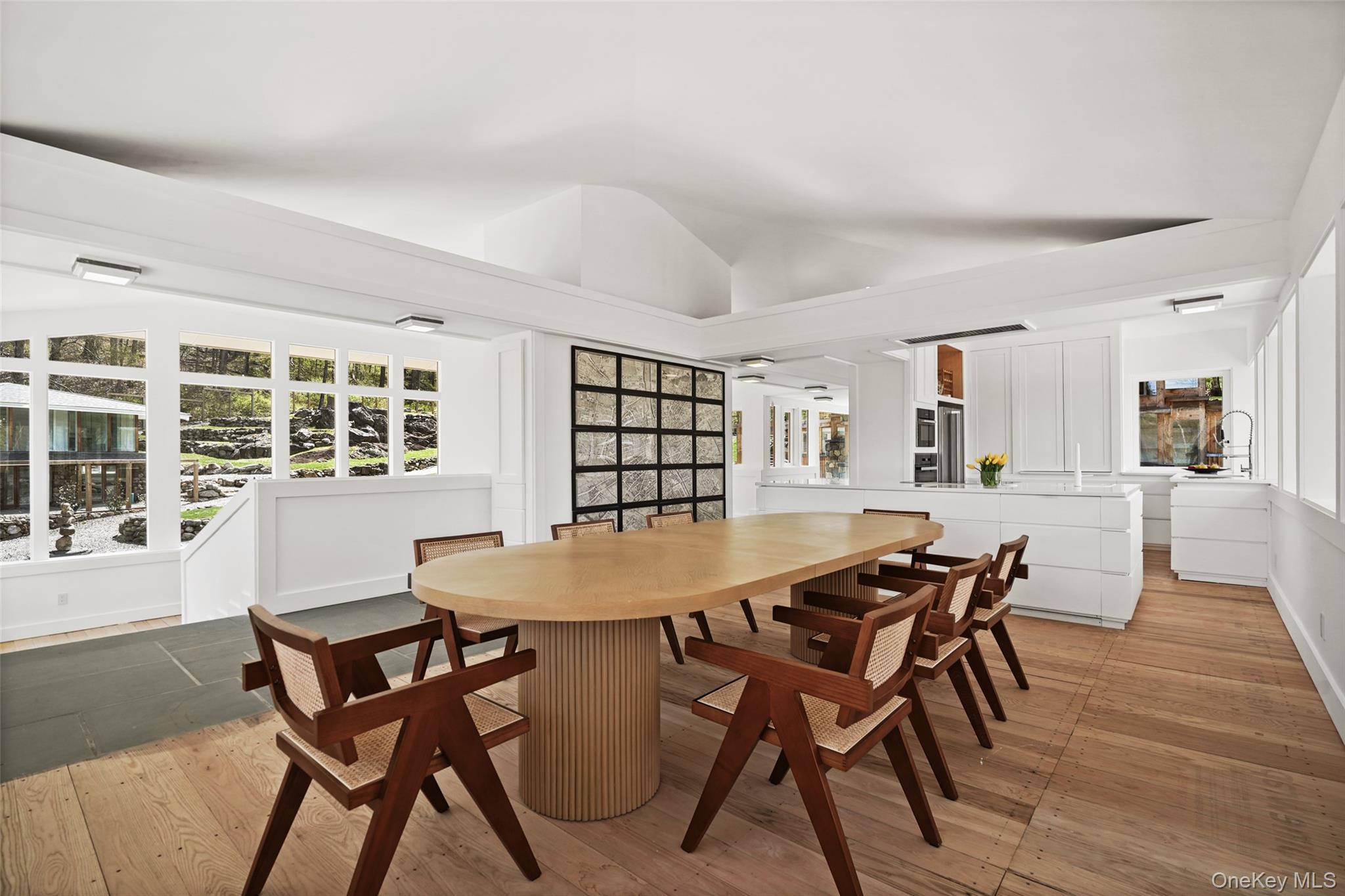 496 Haines Road Bedford Corners, NY 10549 - Photo 8 of 35 a view of a dining room with furniture and wooden floor