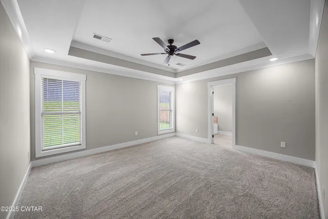 a view of storage and utility room with wooden floor