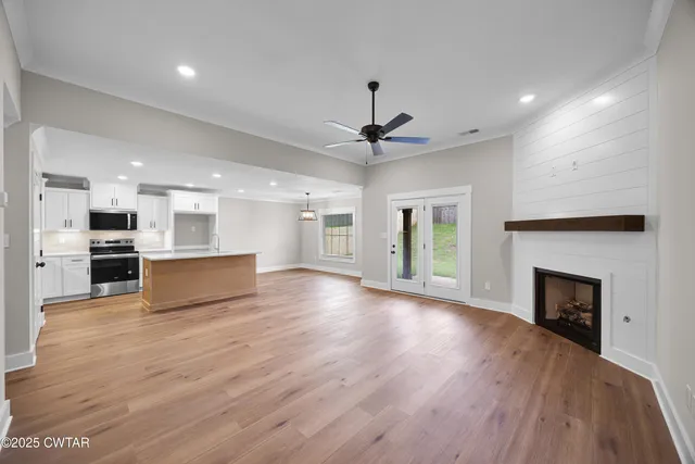 a picture of a book and a white bed