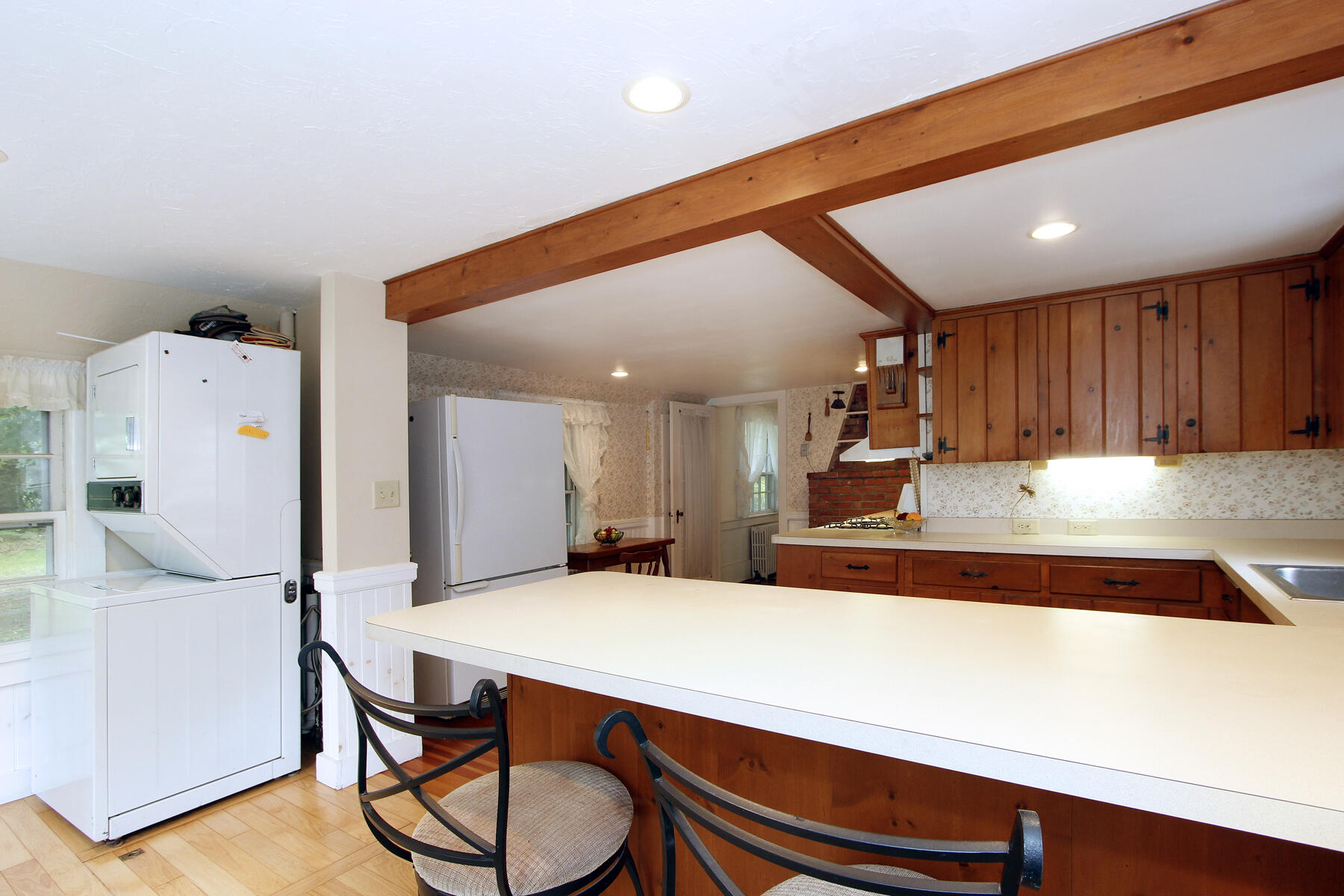 958 Long Pond Road Brewster, MA 02631 - Photo 11 of 38 a room with gym equipment and wooden floor